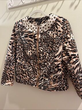 Animal print jacket. Can be worn as a coat or as part of a work ensemble.